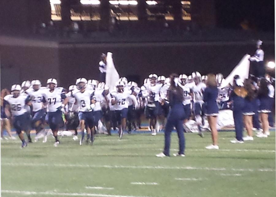 Gondos take the field prior to their playoff game against Crenshaw.