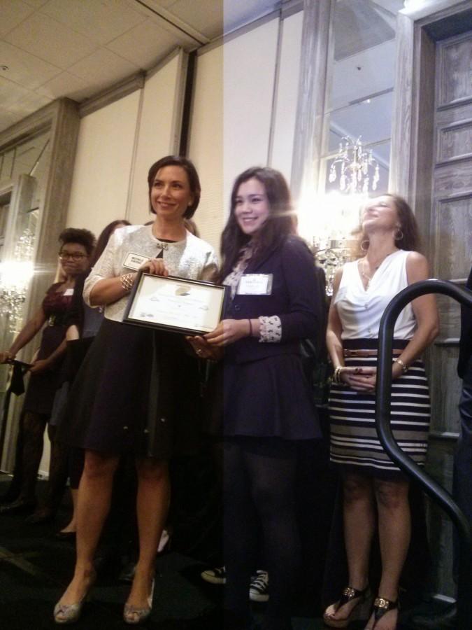 Veronica Vargas accepting her $1000 scholarship.