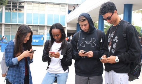 Students on their phones. 
