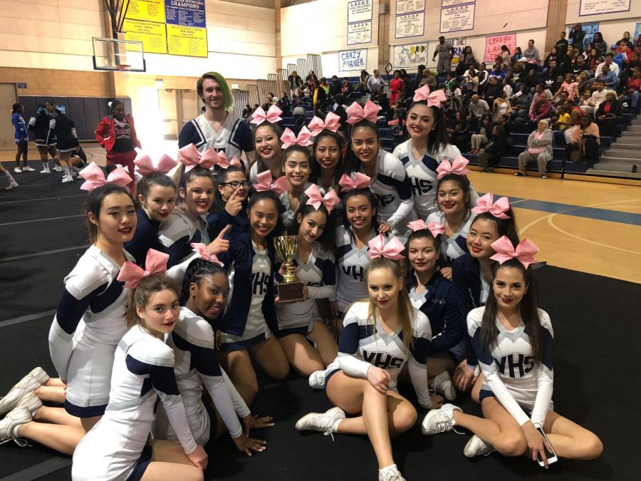 Varsity Cheer poses for photo after winning 2nd place 