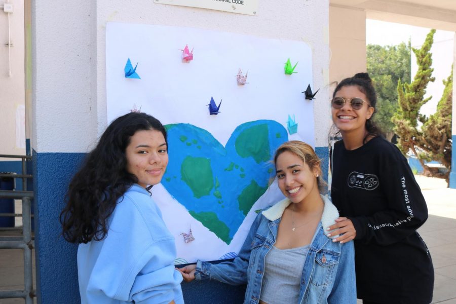 Students make posters for Peace Day.