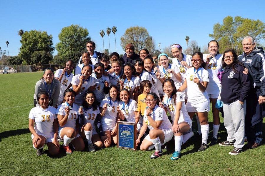 Varsity girls soccer team win Division 5 championships.
