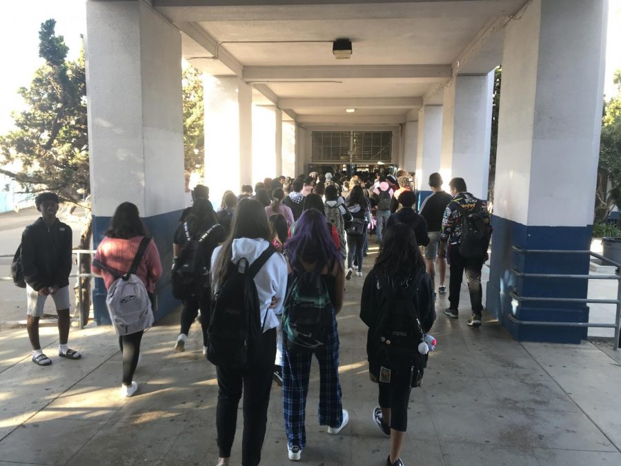 Students lined up outside the Main Building because they had no place to take the PSAT and testing had already started.