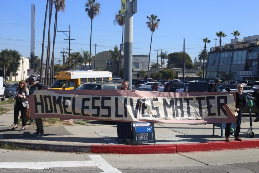 Pro-public housing citizens advocate for homeless rights in Venice.