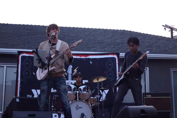 Last year's winners: Junior Filip Stevens, freshman Caleb Wong, and junior Micah Wong perform as The Slurkeys in the Westchester Family YMCA's fourth annual Battle of the Bands May 16.