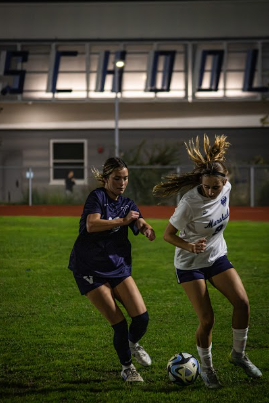 Outrun: Senior Charley Leal chases down a Marshall player at the home game against the Barrister, 10-1, December 1.